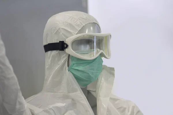 Mannequin with protective mask and spectacles with anti-inflammatory and antibacterial chemical equipment. Medicine and research