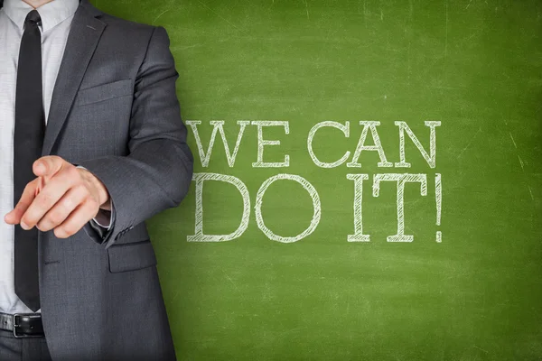 We can do it on blackboard with businessman — Stock Photo, Image
