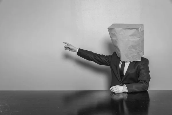 Vintage businessman sitting at office desk — Stock Photo, Image