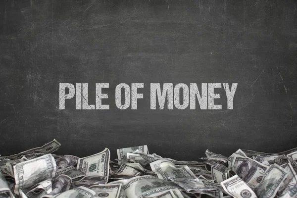 Pile of money text on black background