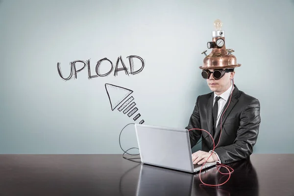 Upload text with vintage businessman using laptop — Stock Photo, Image