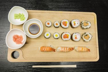 Board with sushi. clipart