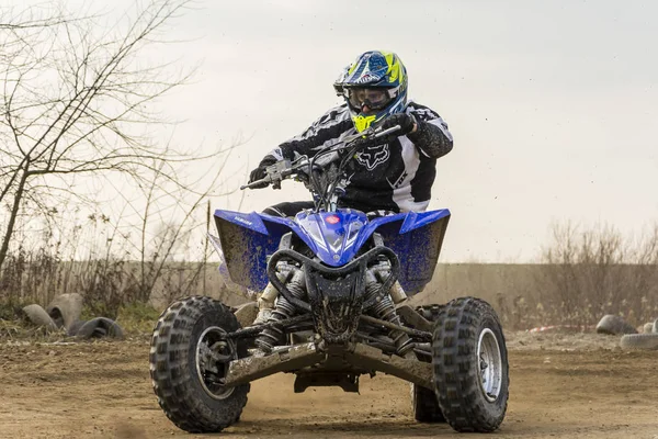 ATV (quad bike) driver in action. Turning training at high speed. — Stock Photo, Image