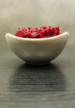 Cooked grated beets and grated horseradish. clipart