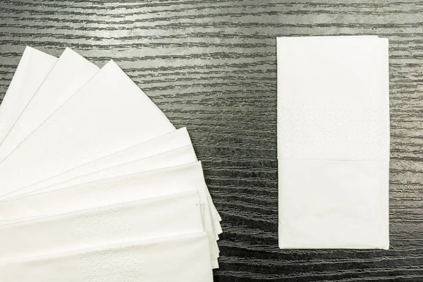 Paper handkerchief on a dark basis. — Stock Photo, Image