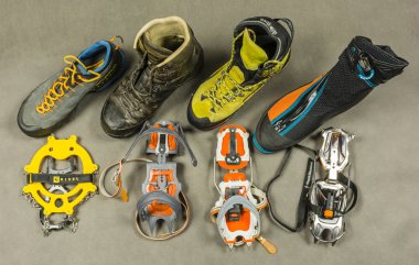 Presentation of various types of crampons and appropriate types of shoes (boots) with patterned fastening. View from above. clipart