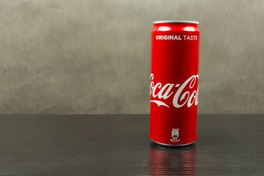 Can of Coca-Cola cherry on a dark background. clipart