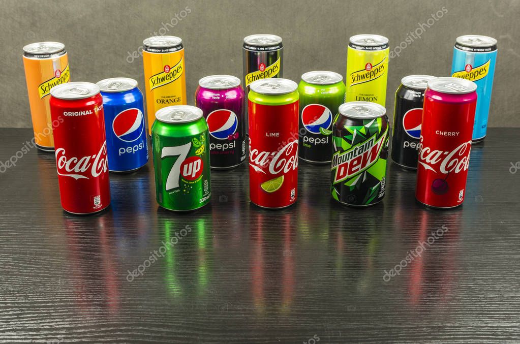 Niedomice, Poland - March 06, 2018: Set of cans from various producers with carbonated soft drinks.