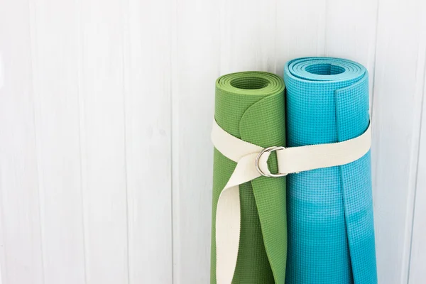 Two yoga mats  white belt — Stock Photo, Image