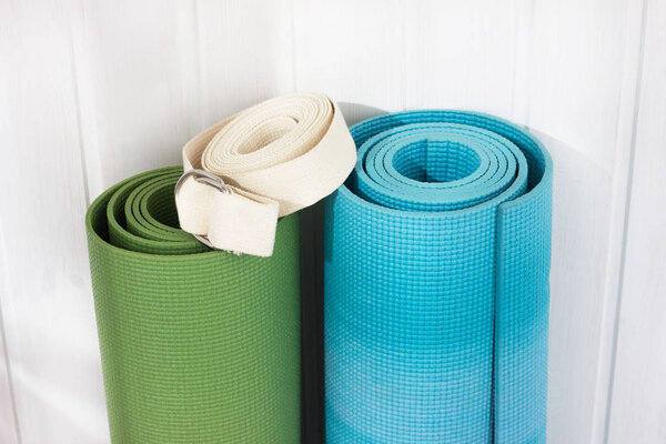 two yoga mats  white belt