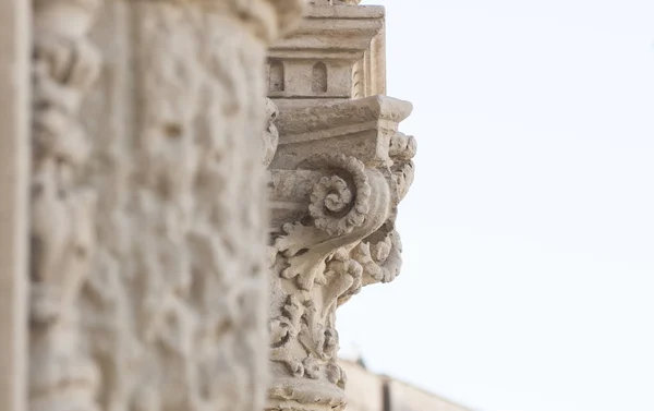 Detail of column and ornaments in baroque style Stock Picture