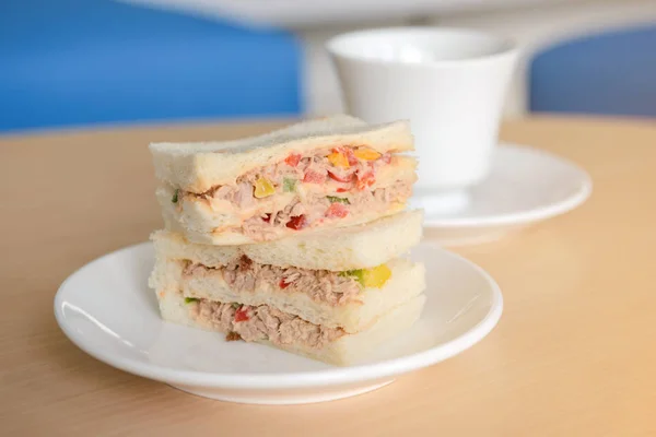 Tuna sandwich with hot tea