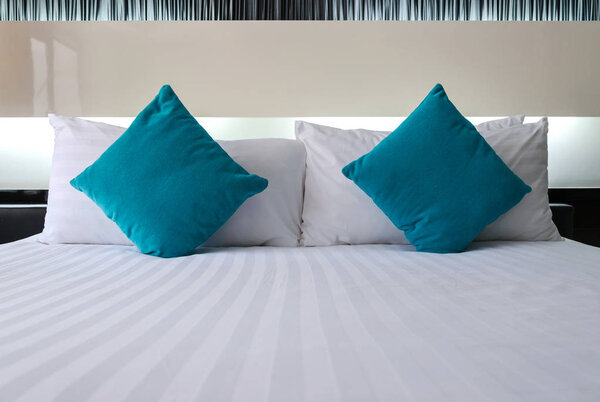Backrest pillow and pillow on bed in modern bedroom