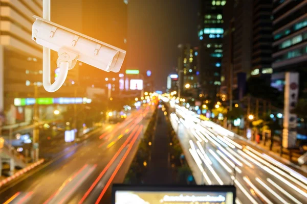 CCTV Security camera with bokeh lights view of Bangkok city. — Stock Photo, Image