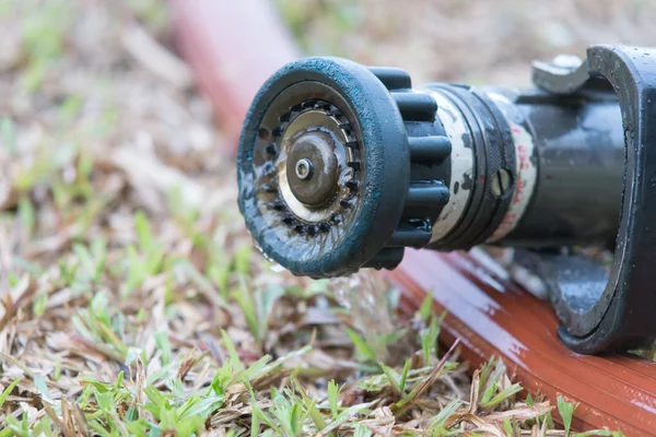 high pressure fire hose nozzle on yard