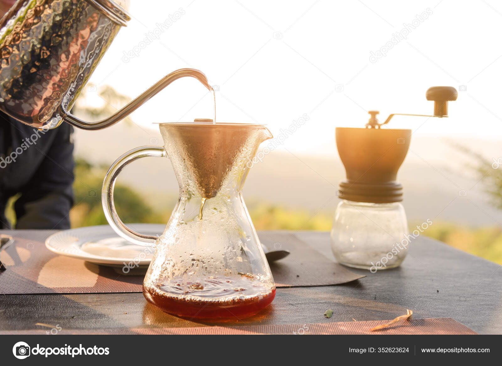 https://st3.depositphotos.com/4024535/35262/i/1600/depositphotos_352623624-stock-photo-hand-drip-coffee-making-pour.jpg