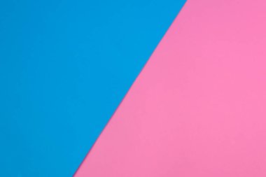 İki ton mavi ve pembe renkli kağıt. arkaplan tasarımı için boş alan. 