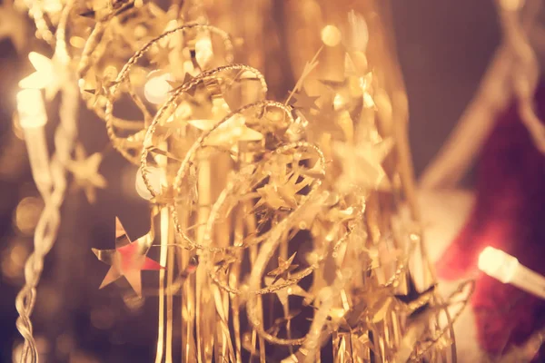 Toned bokeh with blinking Christmas lights in vintage style Stock Image