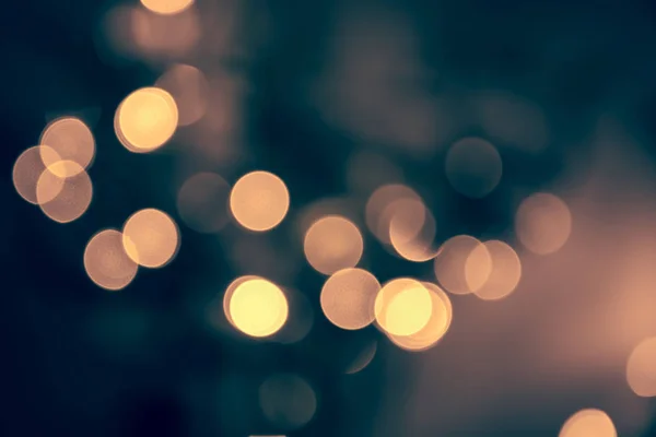 Getinte bokeh met knipperende lichten van Kerstmis in vintage stijl Stockfoto