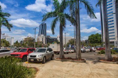 Asuncion, Paraguay - November 09, 2017: The modern part of Asuncion, with one of the twin towers where a shopping mall is housed. Asuncion is the capital of Parraguay. clipart