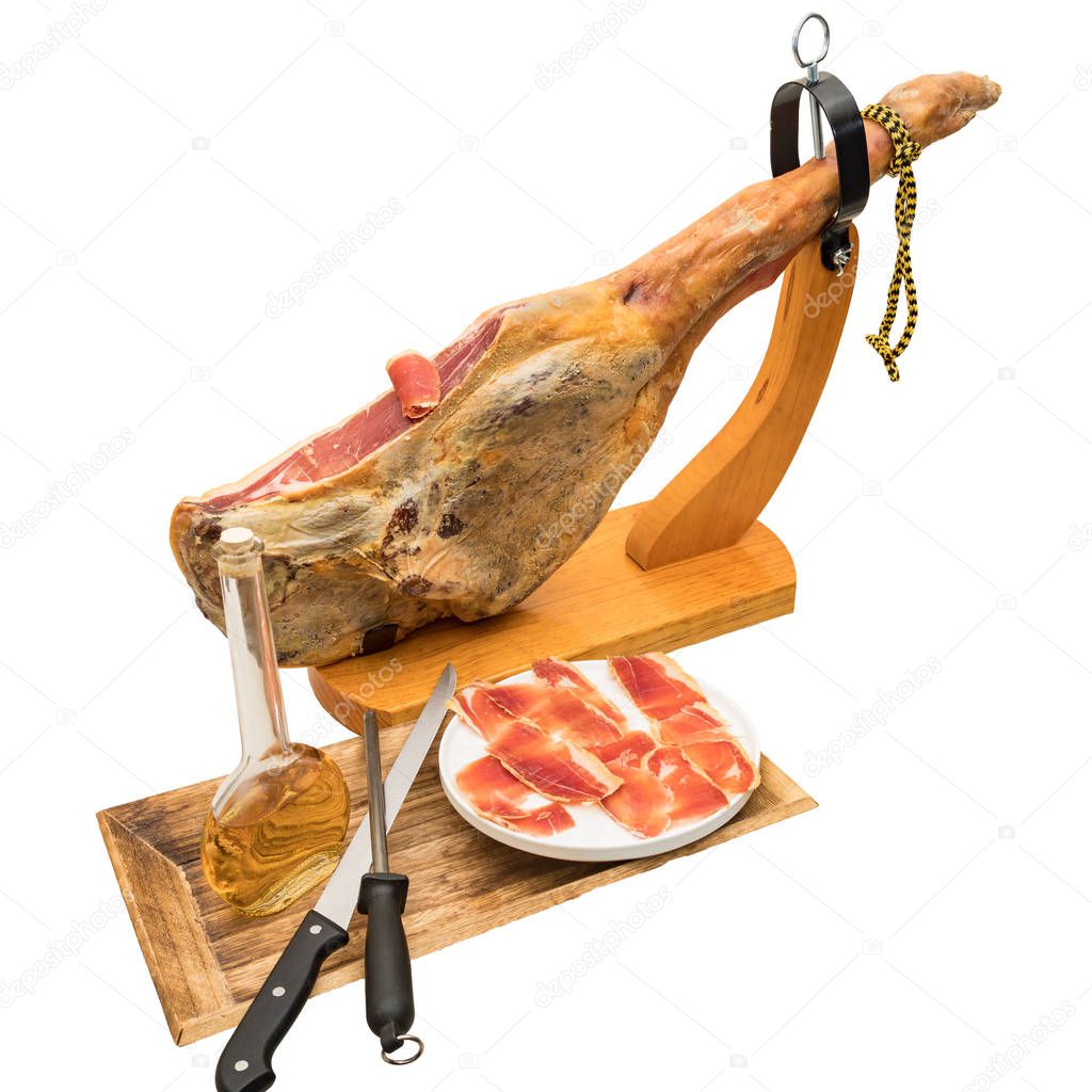 Spanish serrano ham on the leg with wood holder - isolated