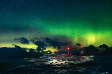 Northern lights. Aurora borealis nature landscape at night clipart