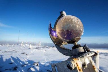 Campbell-Stokes sunshine recorder near meteorological station at winter clipart