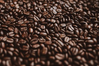 Kavrulmuş kahve çekirdekleri arka plan. Soyut doku deseninin