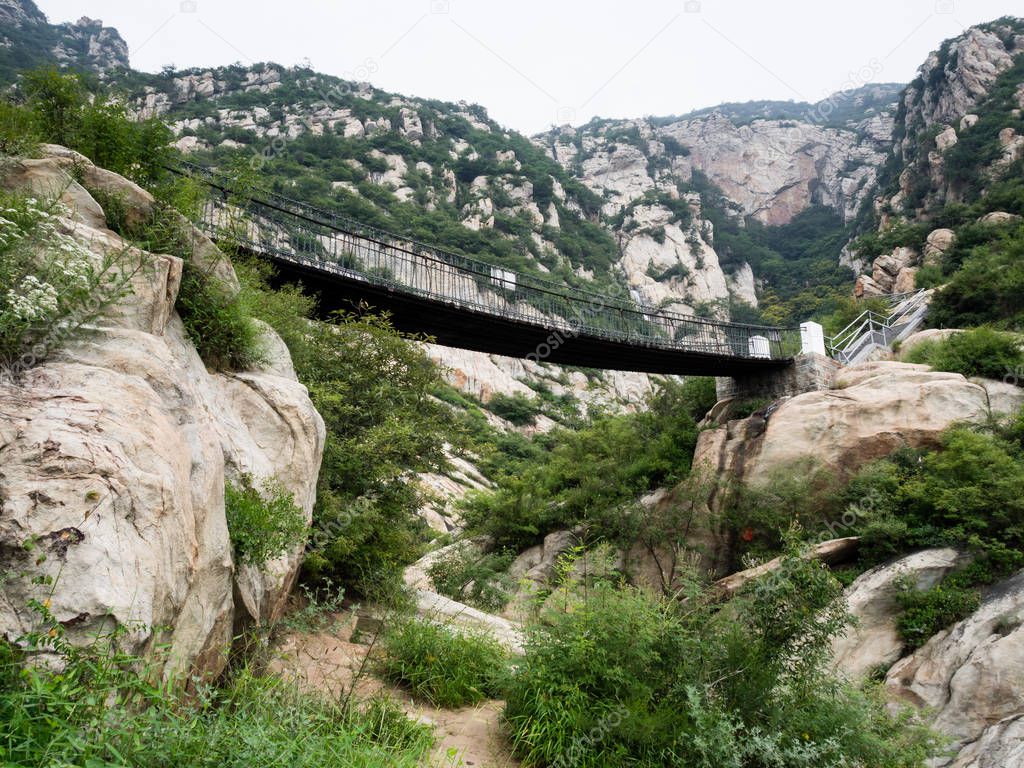 Hanging bridge in sacred taoist Songshan mountains 
