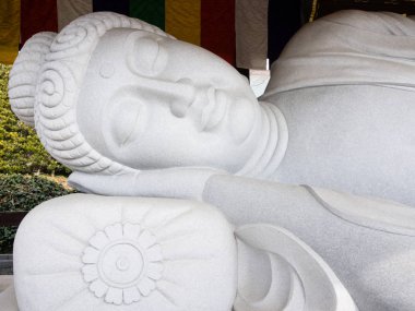 Buda heykeli uyku beyaz mermer