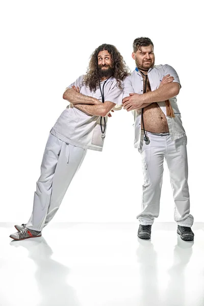 Two funny, lazy doctors playing fools — Stock Photo, Image