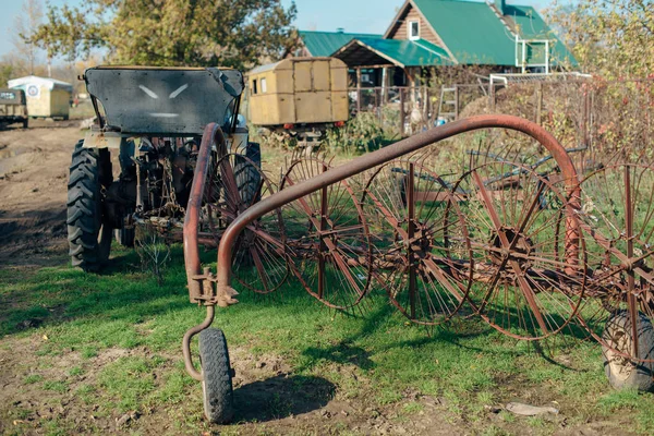 Old rusty plow on the field — Stock Photo, Image
