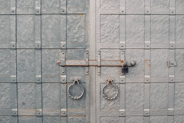 Metal bolt on the old gate