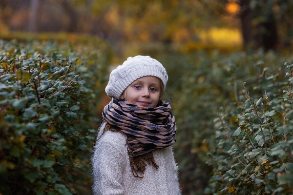 Portrait of a girl in winter day hat with curly hair — Stock Photo, Image