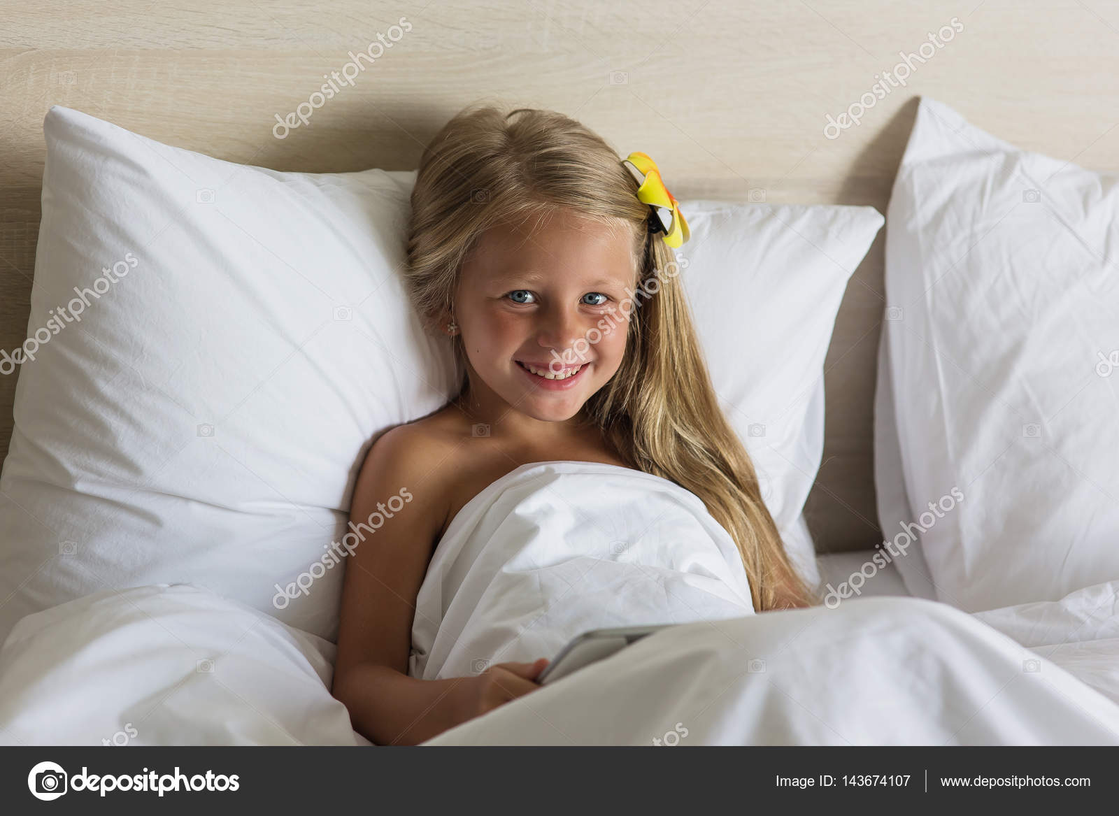 Portrait Of A Little Adorable Little Girl Smiling In