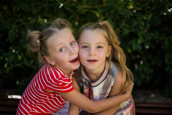 Two Happy Girls Hugging Girlfriend — Stock Photo, Image