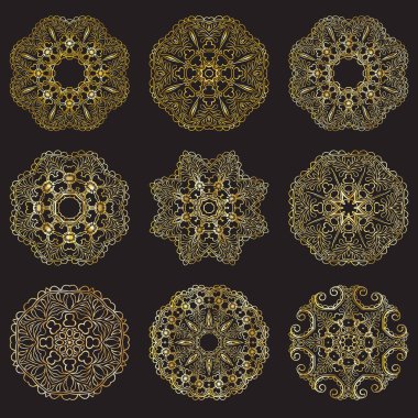 Altın mandalalar, siyah bir zemin üzerine tasarım öğeleri koleksiyonu.
