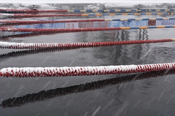 Winter swimming pool snowfall