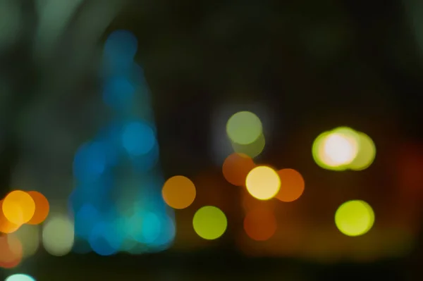 Bokeh offuscata sul tema del Natale in ambiente urbano — Foto Stock