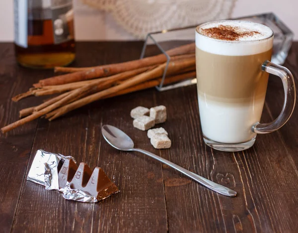 Latte with cinnamon and walnut syrup — Stock Photo, Image