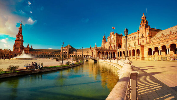 Seville, Spain - 10 February 2020 : Plaza de Espana Spain Square with Boats on the Canal in Beautiful Seville Spain City Center