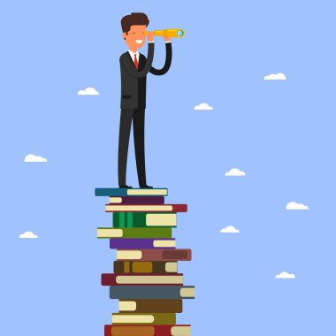 İşadamı kitap yığını üzerinde duruyor