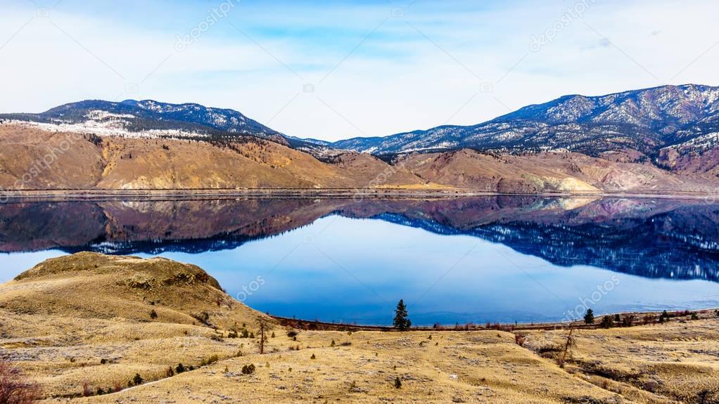 Mountainous reflections in  Kamloops Lake, in British Columbia, Canada