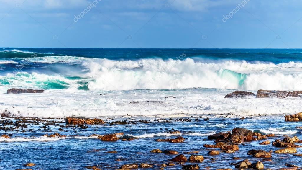 Waves of the Atlantic Ocean breaking on the rocky shores of Cape of Good Hope