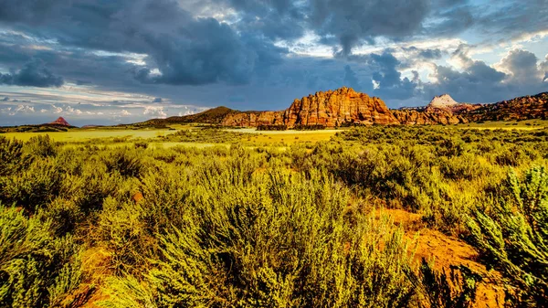 stock image Dark clouds over the Red Sandstone Mountains viewed from the Kolob Terrace Road as it winds its way to the 8,000 ft altitude of the Kolob Plateau in Zion National Park, Utah, United States