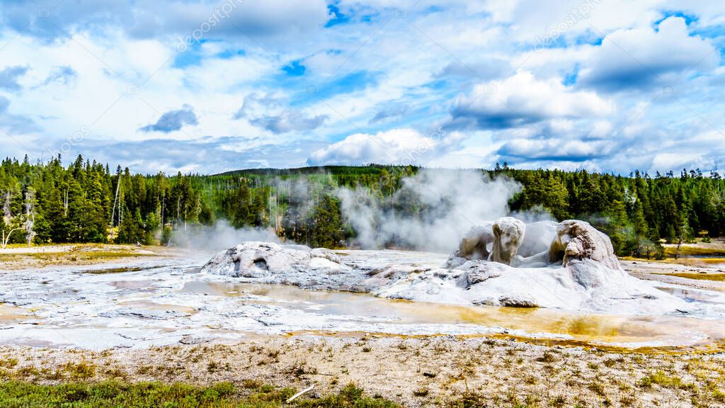 Steam coming out of the Grand Geyser in the Upper Geyser Basin along the Continental Divide Trail in Yellowstone National Park, Wyoming, United States