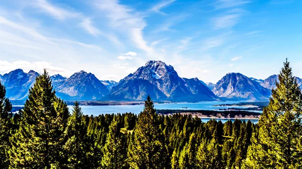 Jackson Lake and the tall mountain peak of Mount Moran in the Teton Range viewed from Signal Mountain in Grand Teton National Park in Wyoming, United States