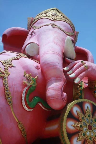 close-up ancient carving of clining peace Ganesha god, god of successful