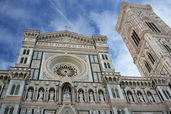 The marvellous art statue and painting decorated surrounding on Florance duomo, The mistery sculpture on Famous white Architectural cathedral church under blue sky at Florance, The largest church in Italy, travel destination backgrounds
