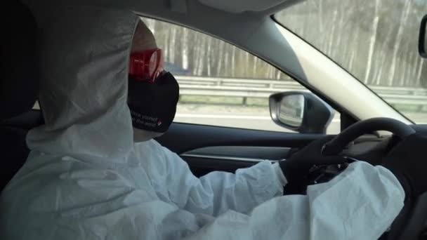 Man Protective Suit Mask Glasses Driving Car — Stock Video